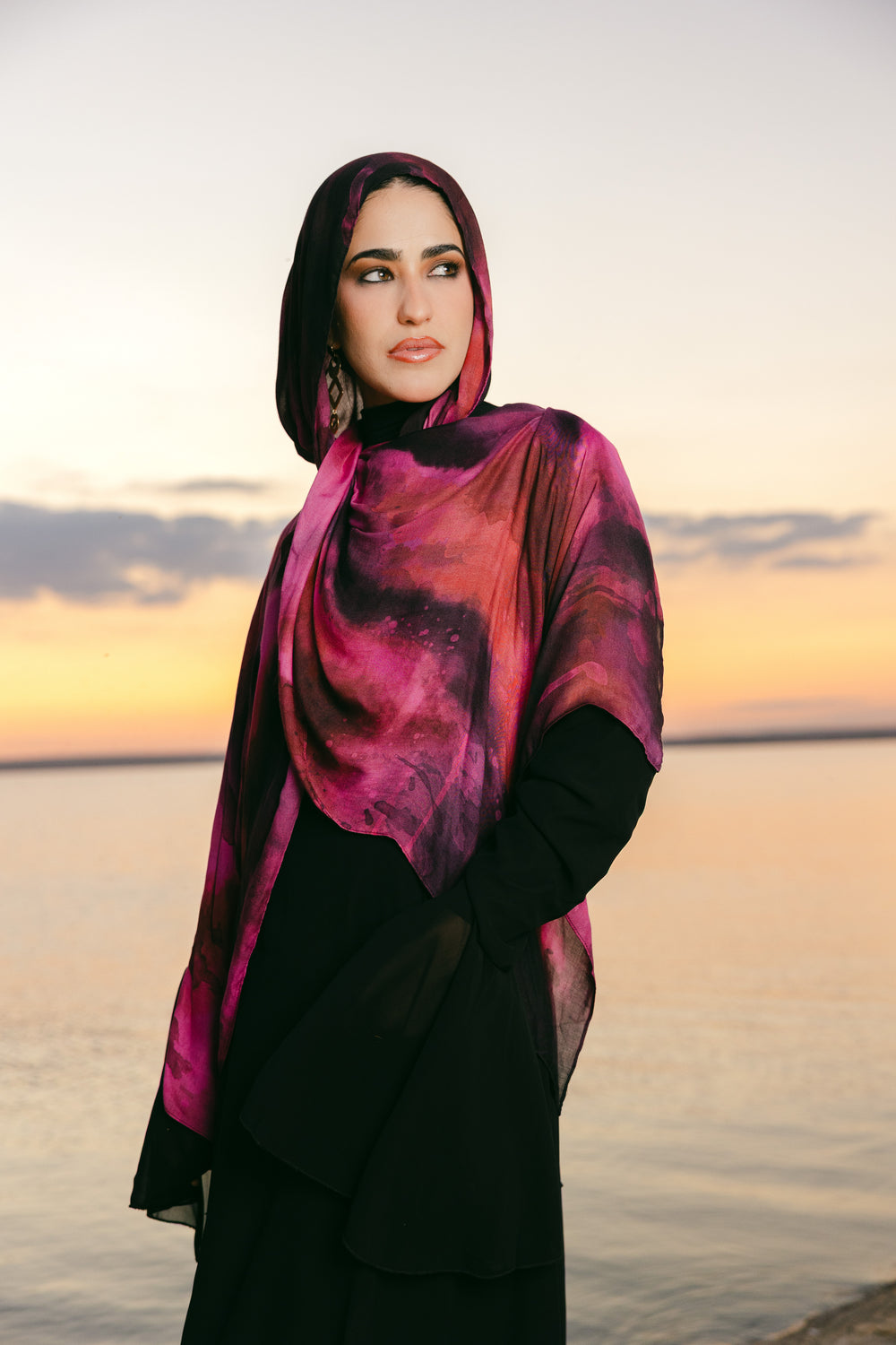 Jumrah modal scarf worn as a lightweight hijab with warm fluid drape – وشاح جمرة مودال يُرتدى كحجاب خفيف بانسيابية دافئة