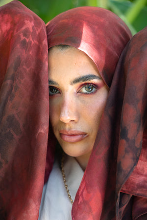 Sienna printed premium modal scarf with warm earth tones, expressive layered textures, and lightweight breathable drape by WOROOD
