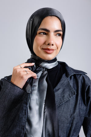 Worood Divine Noire Silk Scarf Rectangle – elegant black silk scarf with a smooth, lustrous finish - وشاح حريري مستطيل من Worood Divine Noire - وشاح حريري أسود أنيق بلمسة نهائية ناعمة ولامعة 