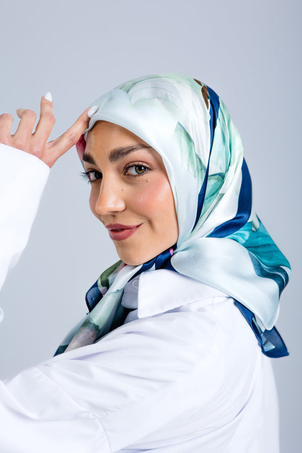 Worood Elysian Silk Scarf Square – elegant pastel silk scarf with a soft, airy drape وشاح حريري Elysian Silk Scarf  مربع من ورود إليسيان - وشاح حريري أنيق بلون الباستيل مع ثنيات ناعمة وجيدة التهوية
